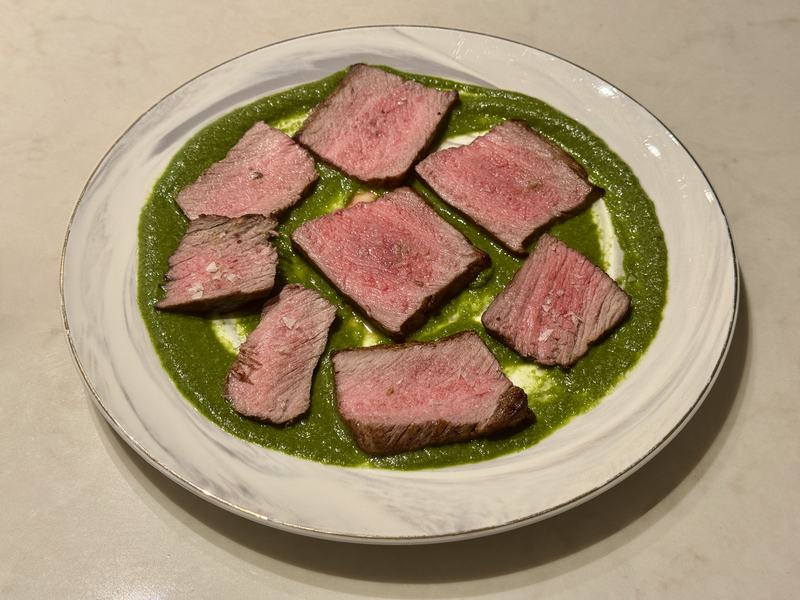 Beef Tetaki on a vivid green spread